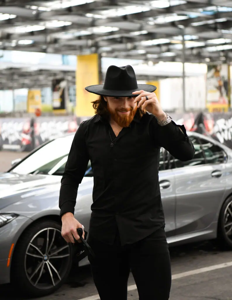 Liam O'Brien shows off his fashion.