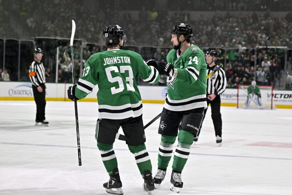 Dallas Stars forwards Wyatt Johnston and Jamie Benn