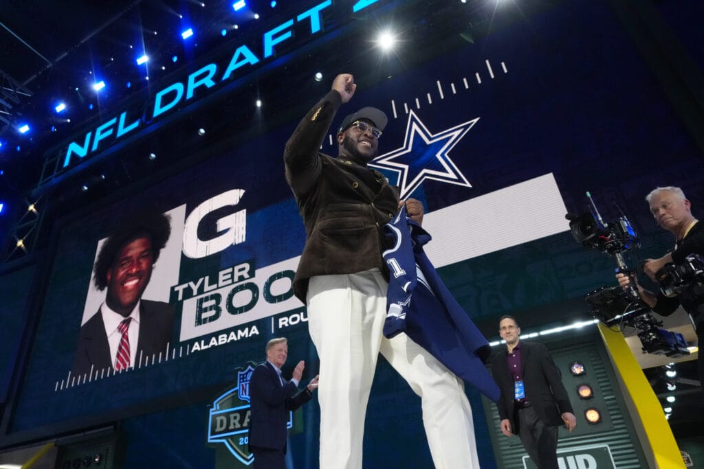 The pick is in: Dallas Cowboys take Alabama guard Tyler Booker 12th, continue overall offensive line