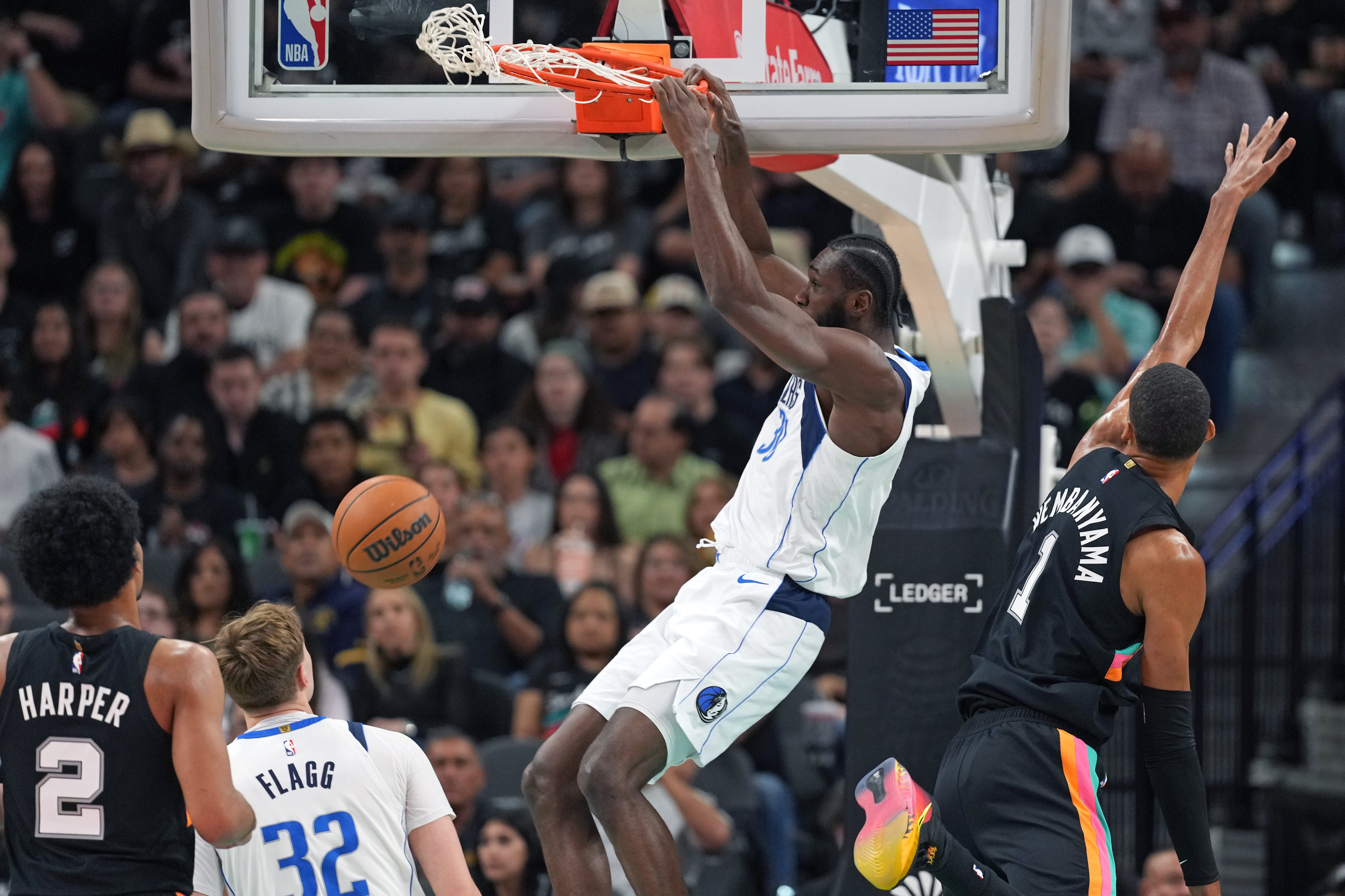 Mavericks' Cooper Flagg and Moussa Cisse