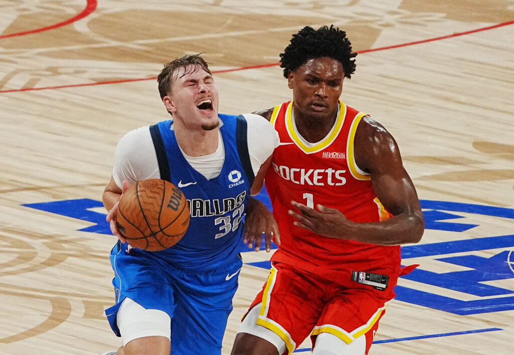 Basketball - NBA - Preseason - China Games 2026 - Dallas Mavericks v Houston Rockets - The Venetian Arena, Macao, China - October 9, 2026 Dallas Mavericks' Cooper Flagg in action with Houston Rockets' Amen Thompson REUTERS/Lam Yik