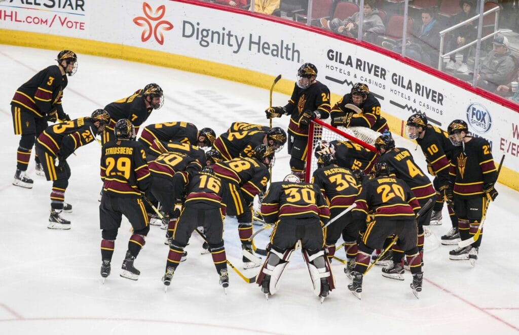 ASU hockey player Peter Zhong embracing the homecoming of his first Olympics