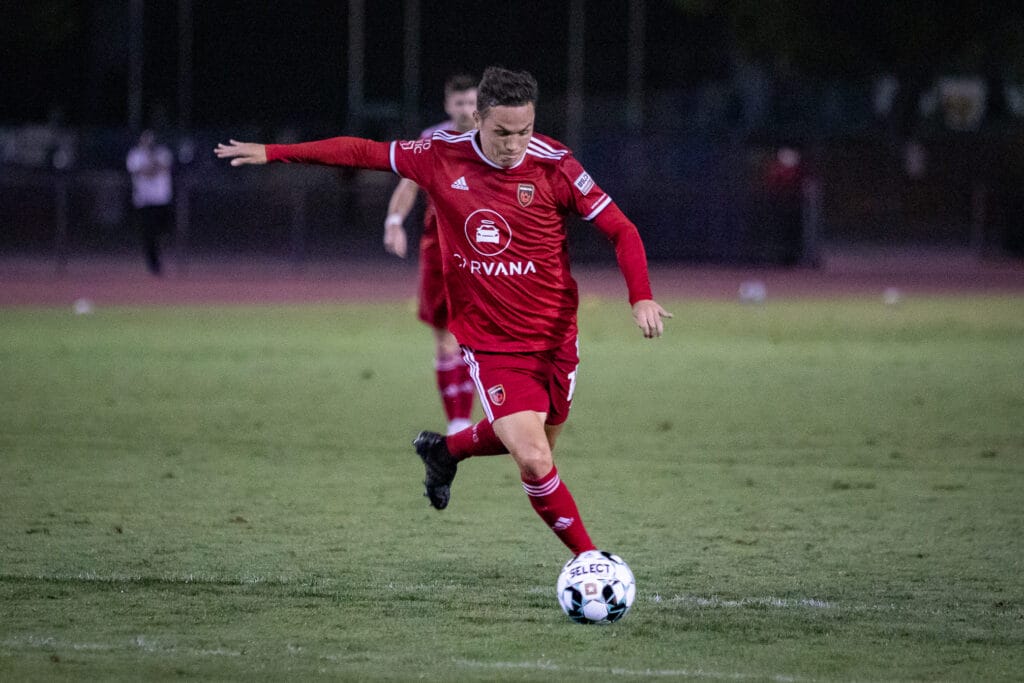 How does Phoenix Rising find international players?