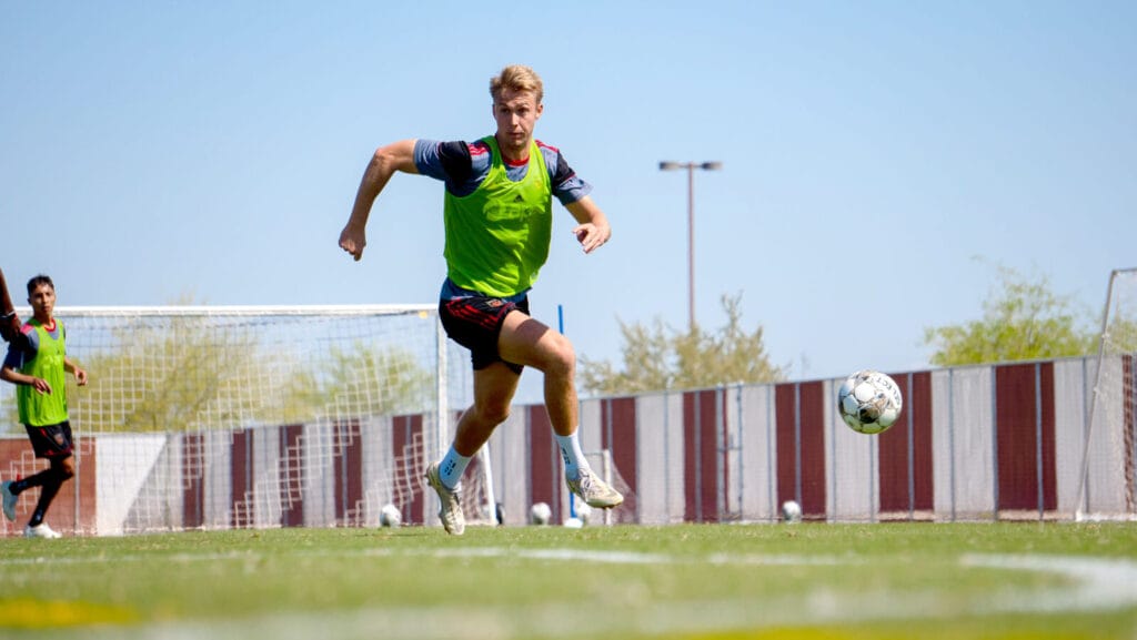 After month-long wait for visa, Haugli eager for Rising debut