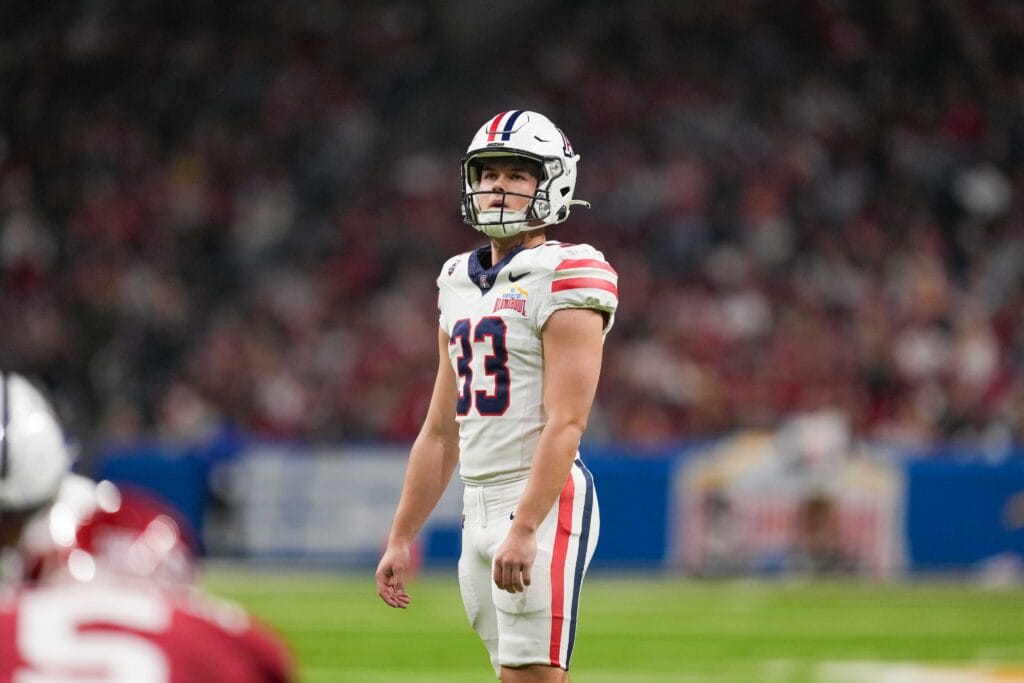 Arizona Wildcats kicker Tyler Loop looks up before a kick against the Oklahoma Sooners in the 2023 Alamo Bowl. (Daniel Dunn-USA TODAY Sports)