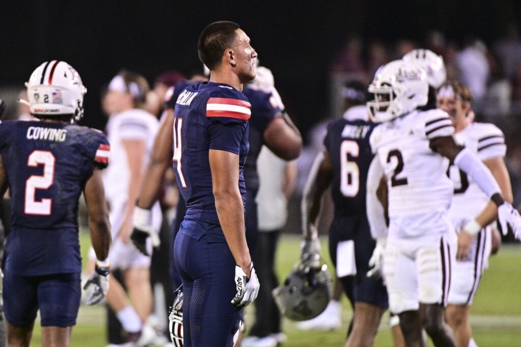 The Wildcats' Tetairoa McMillan reacts after the loss to Mississippi State.