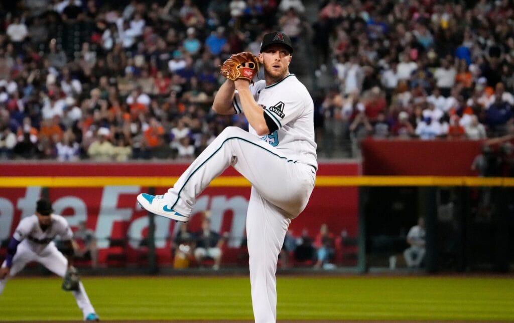 Diamondbacks starting pitcher Merrill Kelly (29) throws to the Houston Astros in the first inning at Chase Field. Mandatory Credit: Rob Schumacher-Arizona Republic
