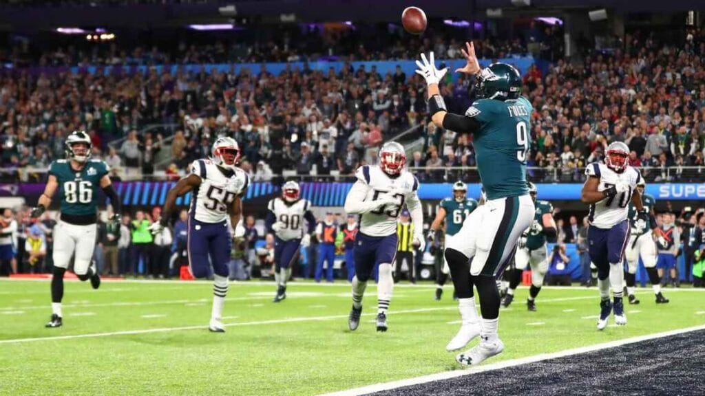 Former Arizona Wildcats QB Nick Foles catches a TD pass against New England in the Super Bowl. (Mark J. Rebila-/USA TODAY Sports)