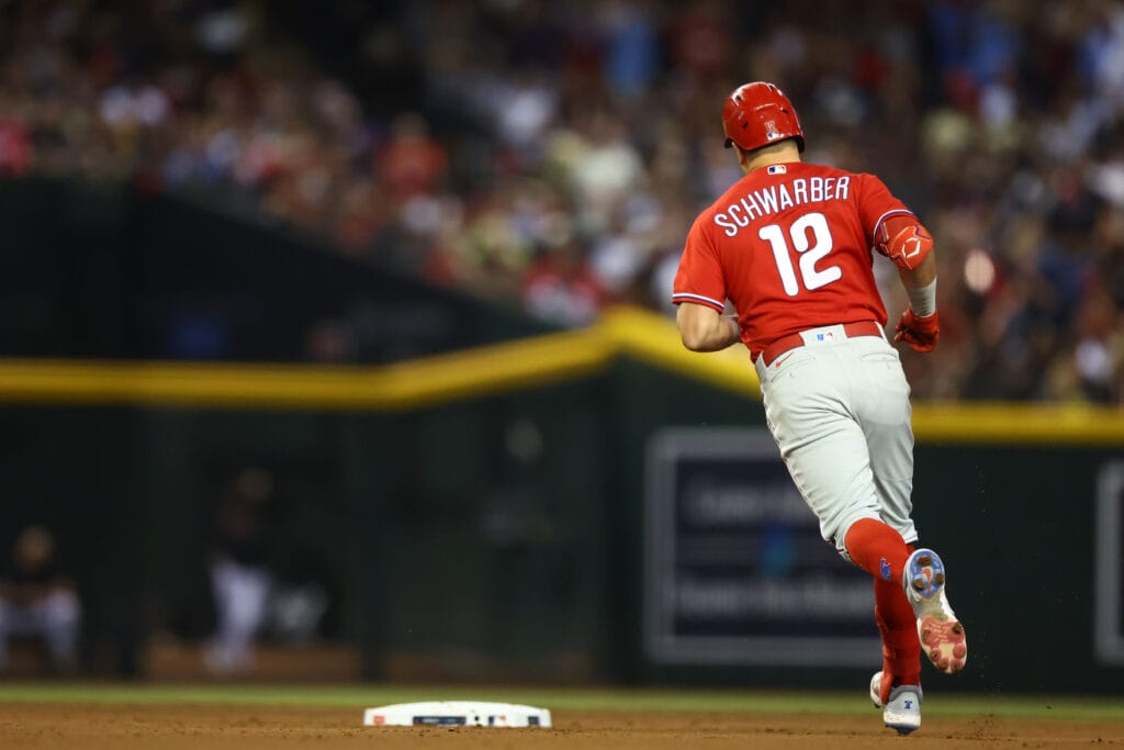 Kyle Schwarber rounds the bases after homering off Zac Gallen in Game 5. (Mark J. Rebilas/USA TODAY Sports)