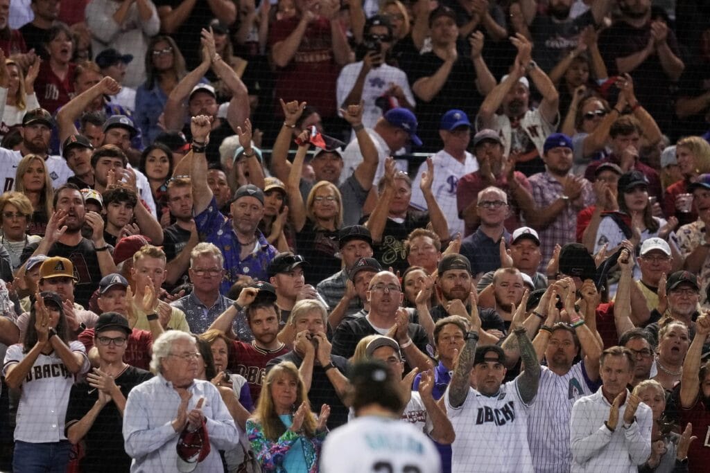 Fans cheer as Arizona Diamondbacks starting pitcher Zac Gallen (23) is pulled from the game during the seventh inning against the Texas Rangers during game five of the 2023 World Series at Chase Field.