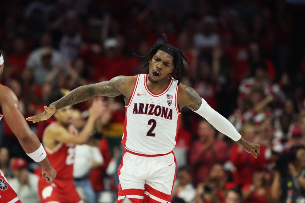 Arizona guard Caleb Love celebrates a basket against Wisconsin. (Zachary BonDurant-USA TODAY Sports)