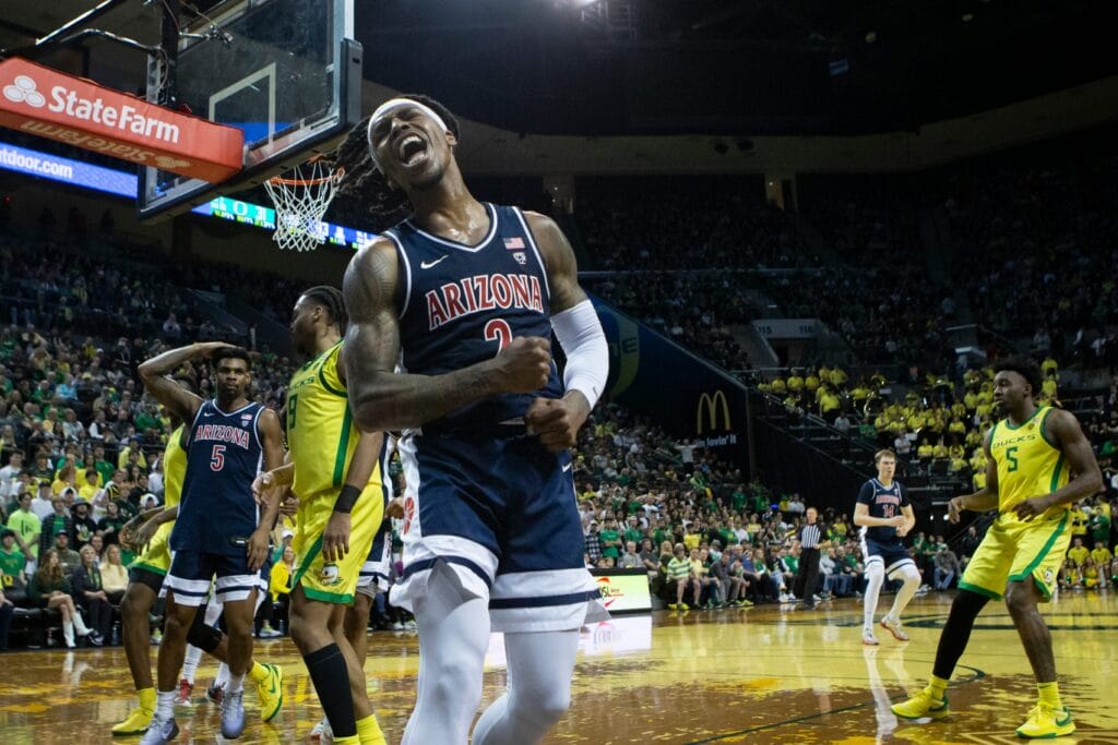 Arizona Wildcats guard Caleb Love celebrates a dunk vs. Oregon. (Ben Lonergan/The Register-Guard-USA TODAY NETWORK)
