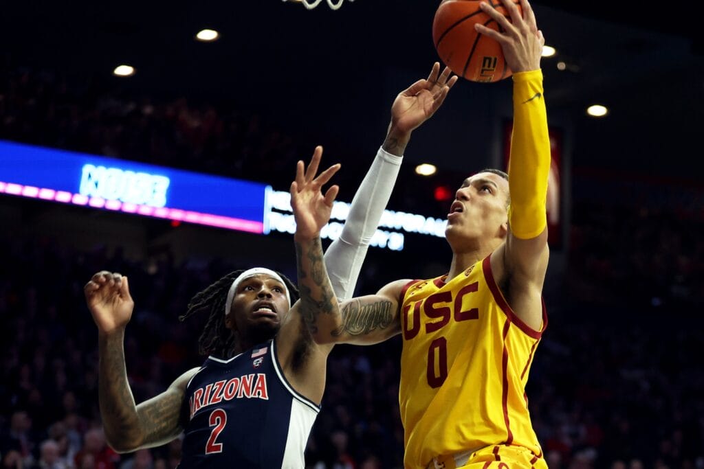USC's Kobe Johnson (0) drives to the basket against Arizona Wildcats guard Caleb Love earlier this season. (Zachary BonDurant-USA TODAY Sports)