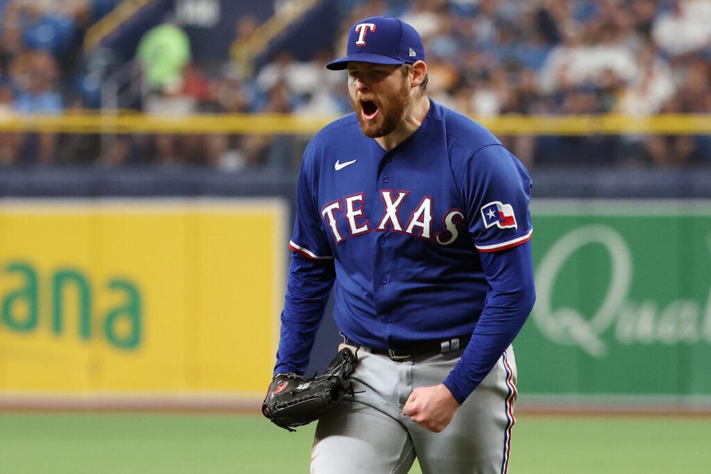 Former Rangers and newly signed Diamondbacks starting pitcher Jordan Montgomery (52) reacts after striking out Tampa Bay Rays pinch hitter Junior Caminero (1) to end the seventh inning during game one of the Wildcard series for the 2023 MLB playoffs at Tropicana Field.