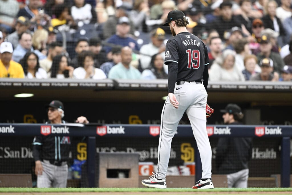 Diamondbacks starting pitcher Ryne Nelson (19) leaves the game during the fourth inning against the San Diego Padres at Petco Park.