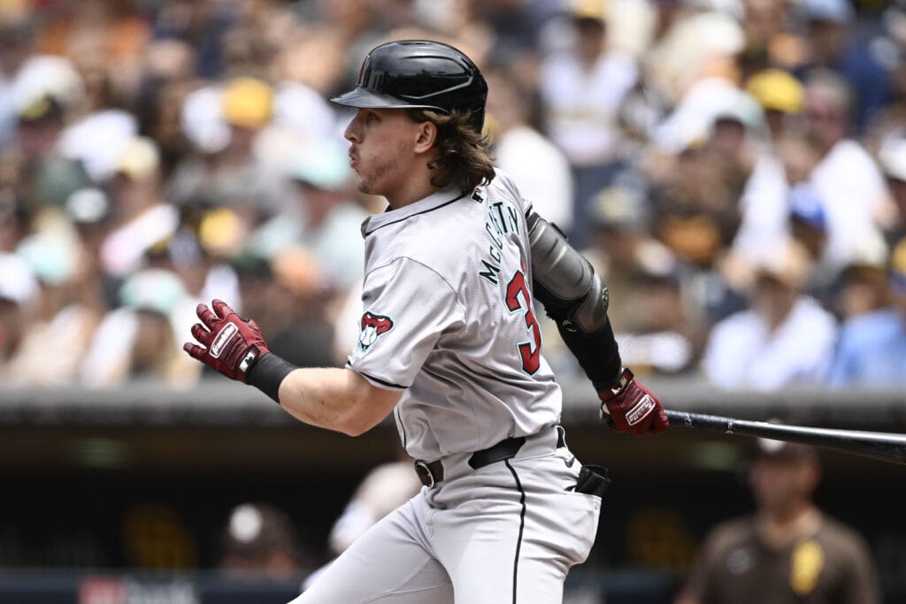 Diamondbacks right fielder Jake McCarthy (31) hits a single during the first inning against the San Diego Padres at Petco Park.