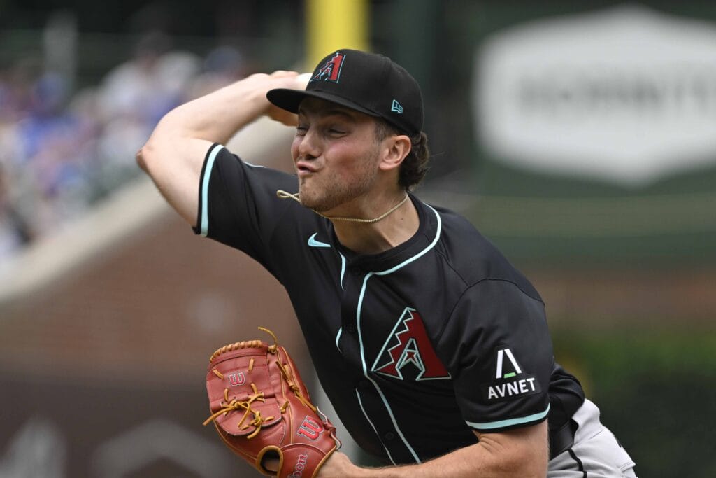 Diamondbacks pitcher Brandon Pfaadt (32) pitches against the Chicago Cubs during the first inning at Wrigley Field.