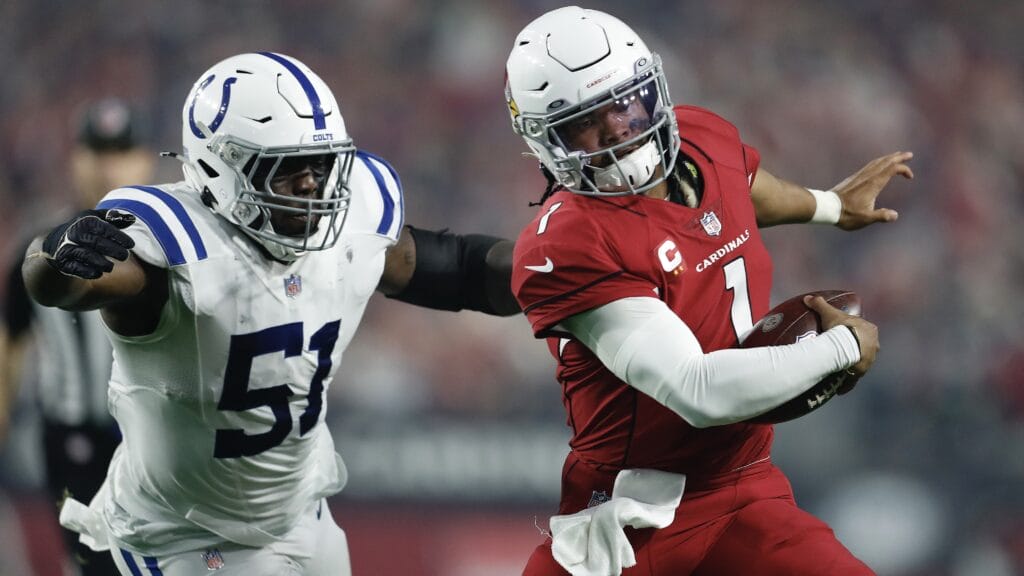 Cardinals QB Kyler Murray scrambles away from the Colts' Kwity Paye during the third quarter at State Farm Stadium on Dec. 25.