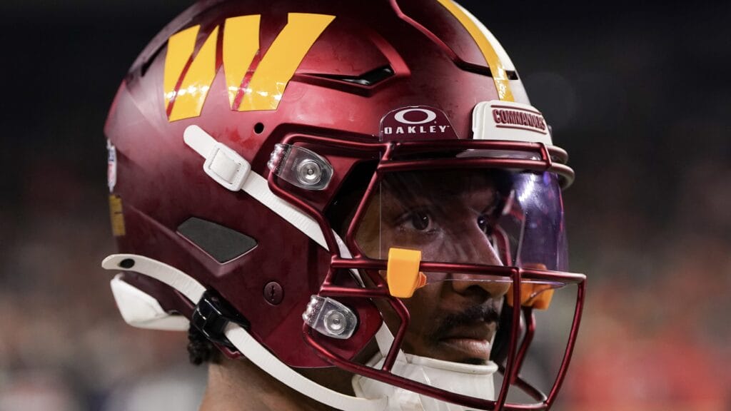 Jayden Daniels of the Washington Commanders looks on in the fourth quarter against the Cincinnati Bengals at Paycor Stadium on September 23, 2024 in Cincinnati.