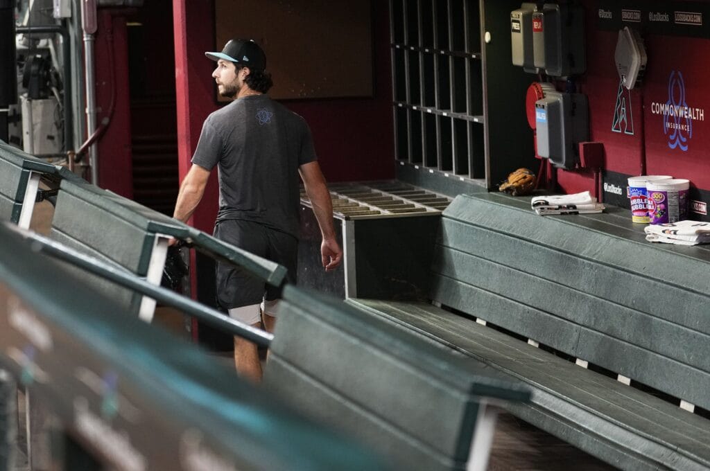 Diamondbacks pitcher Zac Gallen (23) looks at the centerfield screen as the Atlanta Braves beat the New York Mets in the second game of a doubleheader to end the Diamondbacks season at Chase Field in Phoenix on Sept. 30, 2024.