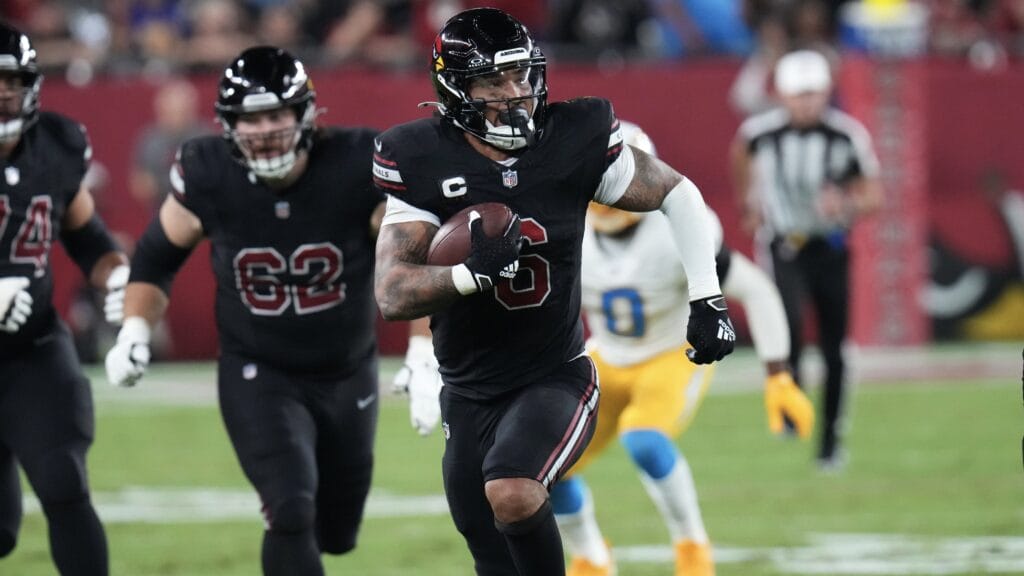 Arizona Cardinals running back James Conner (6) runs the ball against the Los Angeles Chargers at State Farm Stadium.
