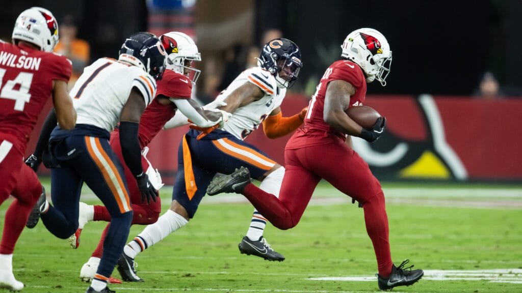 Arizona Cardinals running back Emari Demercado runs for a touchdown against the Chicago Bears in the first half at State Farm Stadium. Mandatory Credit: Mark J. Rebilas-Imagn Images