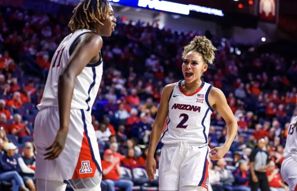 Jada Williams (2) and Sahnya Jah celebrate during the game against UT Arlington. (Photo by Rebecca Sasnett / Arizona Athletics)