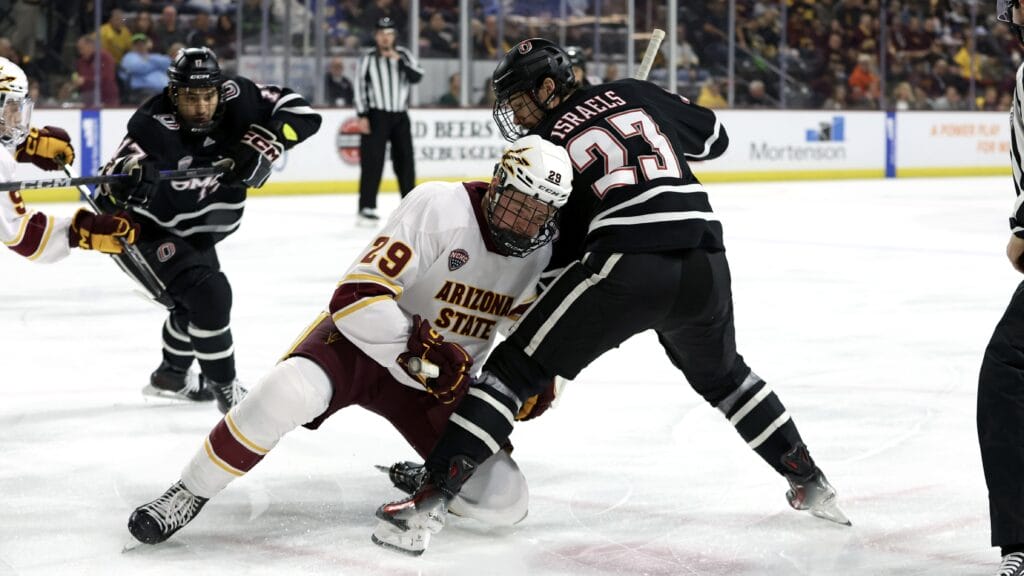 TEMPE, ARIZONA - NOVEMBER 15: Cole Gordon #29 of Arizona State University Sun Devils wins a faceoff against Harrison Israels #23 of University of Nebraska Omaha Mavericks during the first period at Mullett Arena on November 15, 2024 in Tempe, Arizona. (Photo by Zac BonDurant/Getty Images)