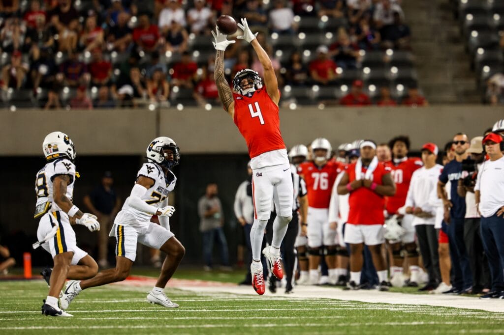 Arizona Wildcats wide receiver Tetairoa McMillan has a way of making defensive backs look small. (Aryanna Frank-Imagn Images)