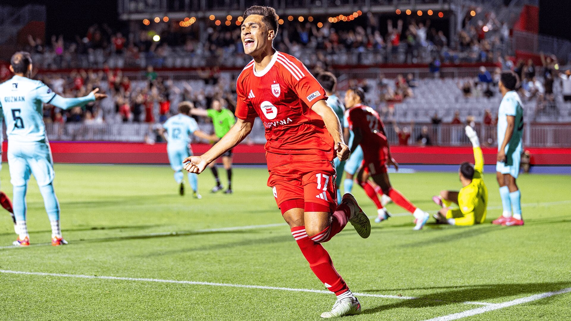 JP Scearce celebrates his opening goal in Phoenix Rising's 2-0 win over Monterey Bay