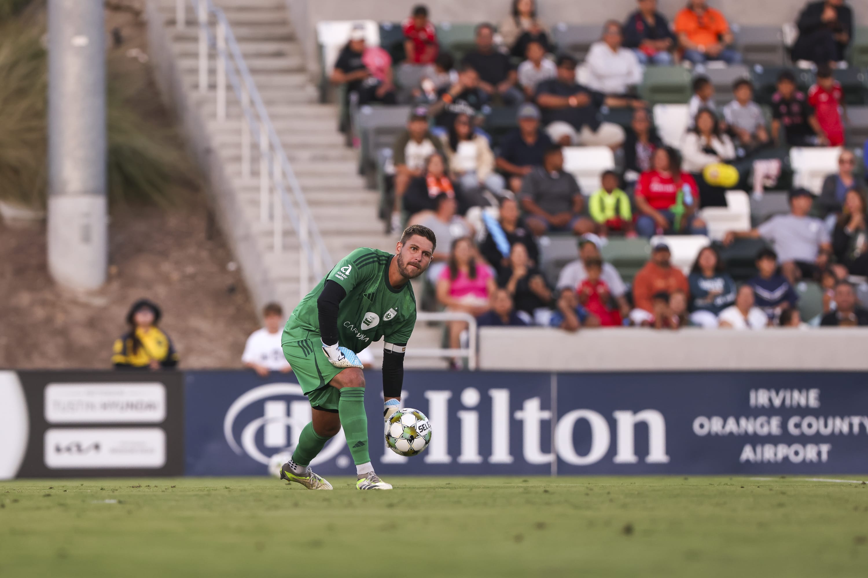 Phoenix Rising goalkeeper Patrick Rakovsky rolls the ball out during the side's 4-1 loss to Orange County. Image: Orange County SC