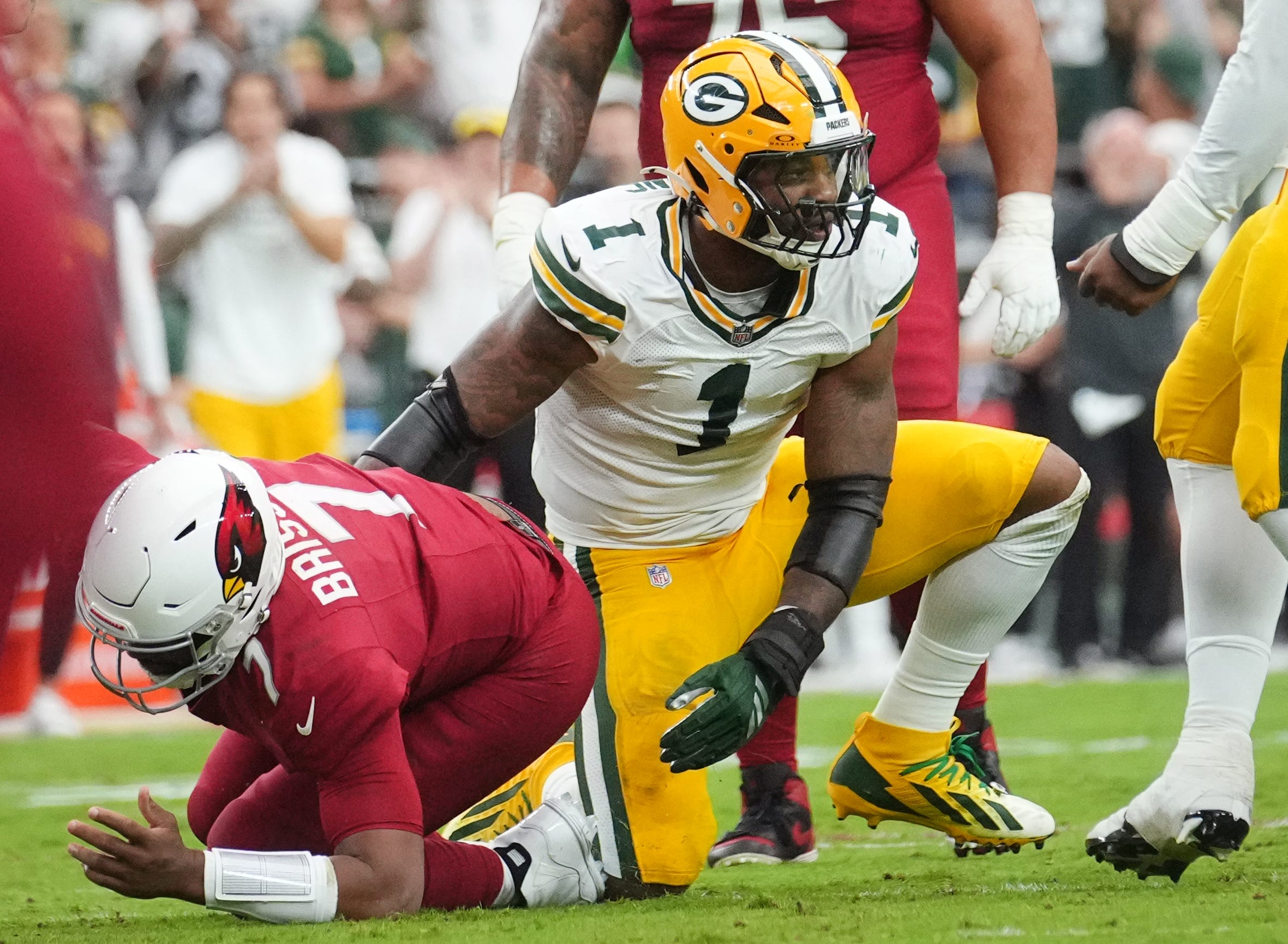 Arizona Cardinals QB Jacoby Brissett sacked by Packers LB Micah Parsons.
