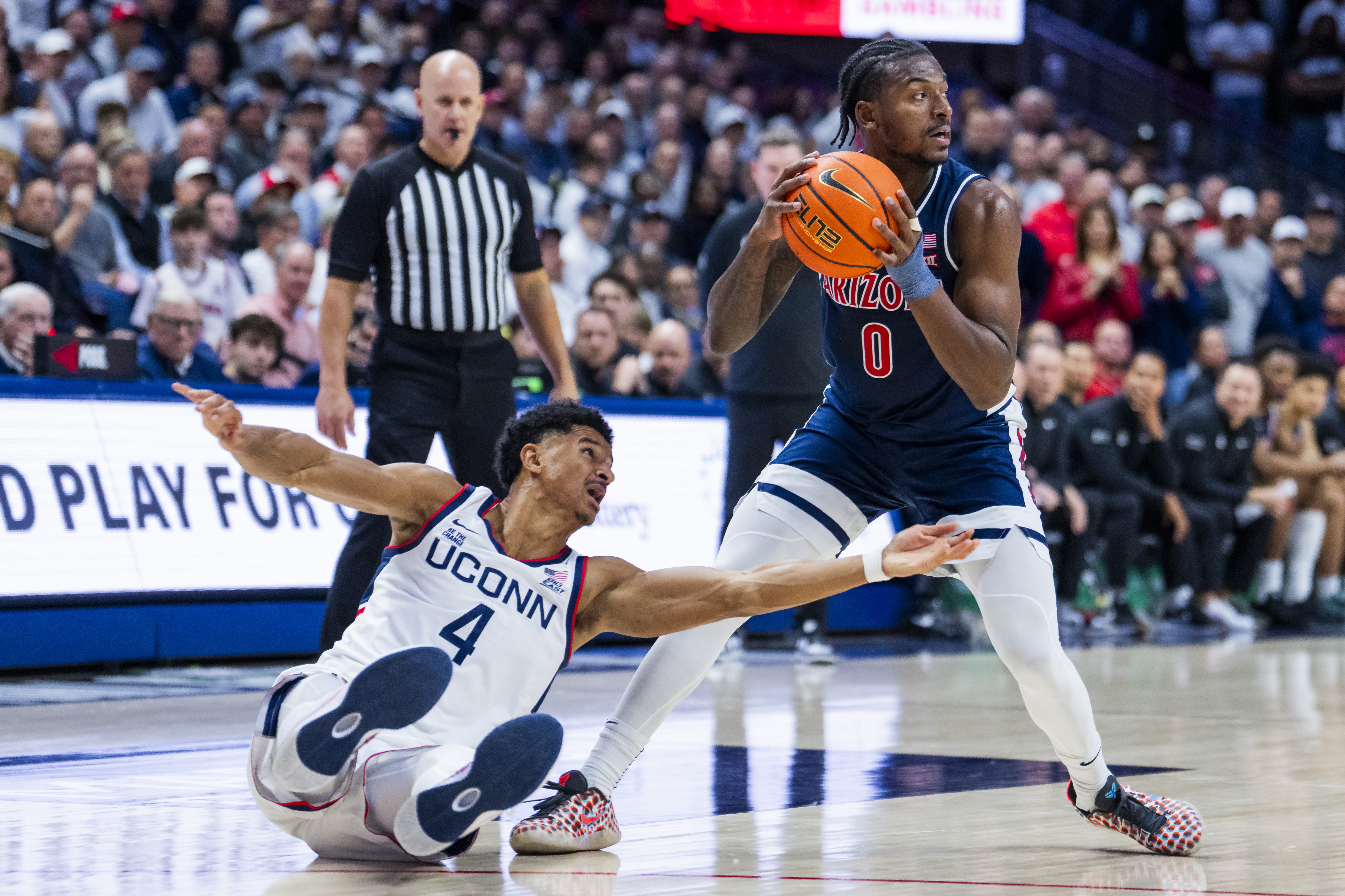 The Arizona Wildcats defeated the UConn Huskies in Storrs, Connecticut 71-67.