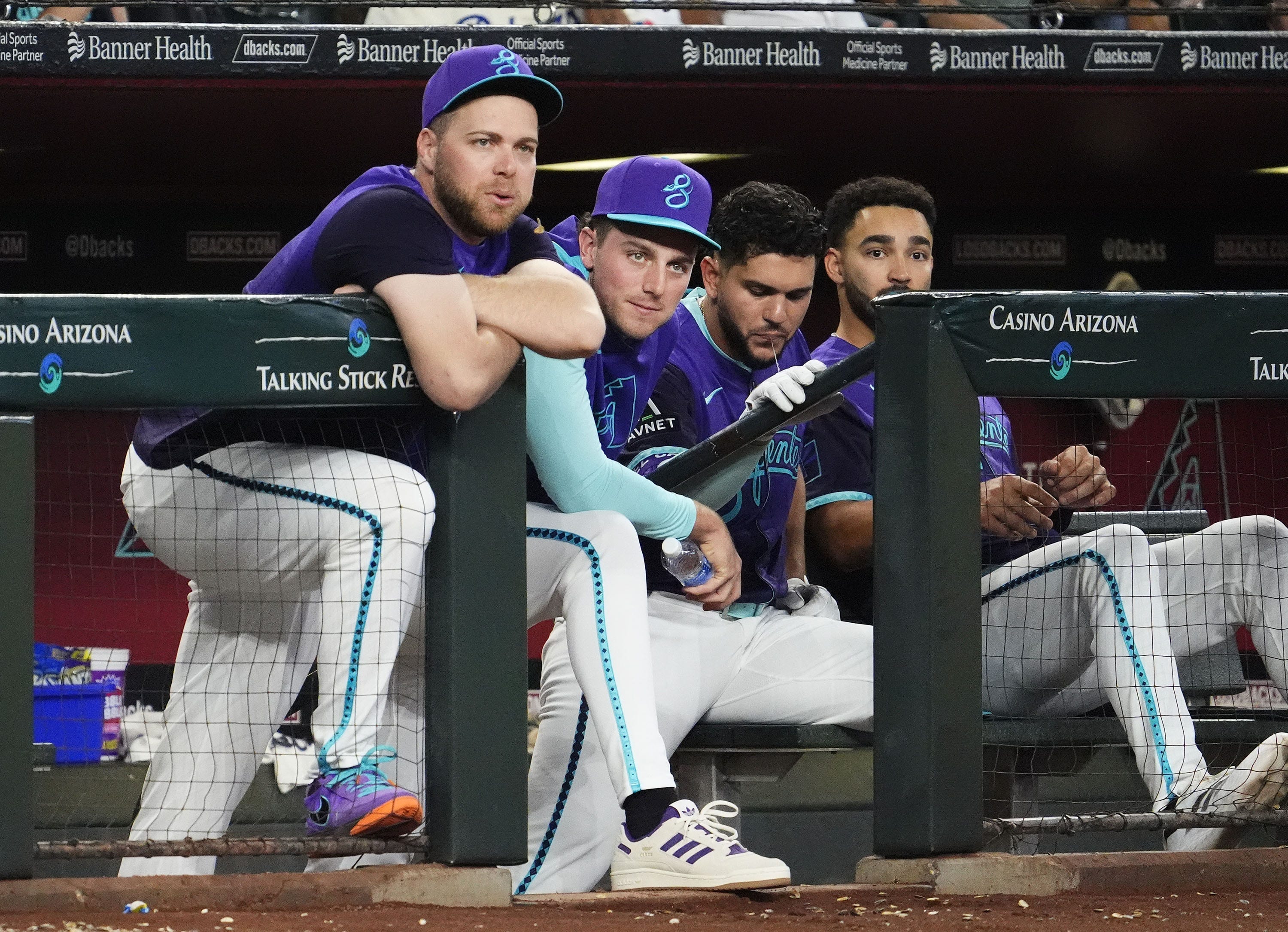 Arizona Diamondbacks starting pitchers Corbin Burnes and Brandon Pfaadt in the dugout.