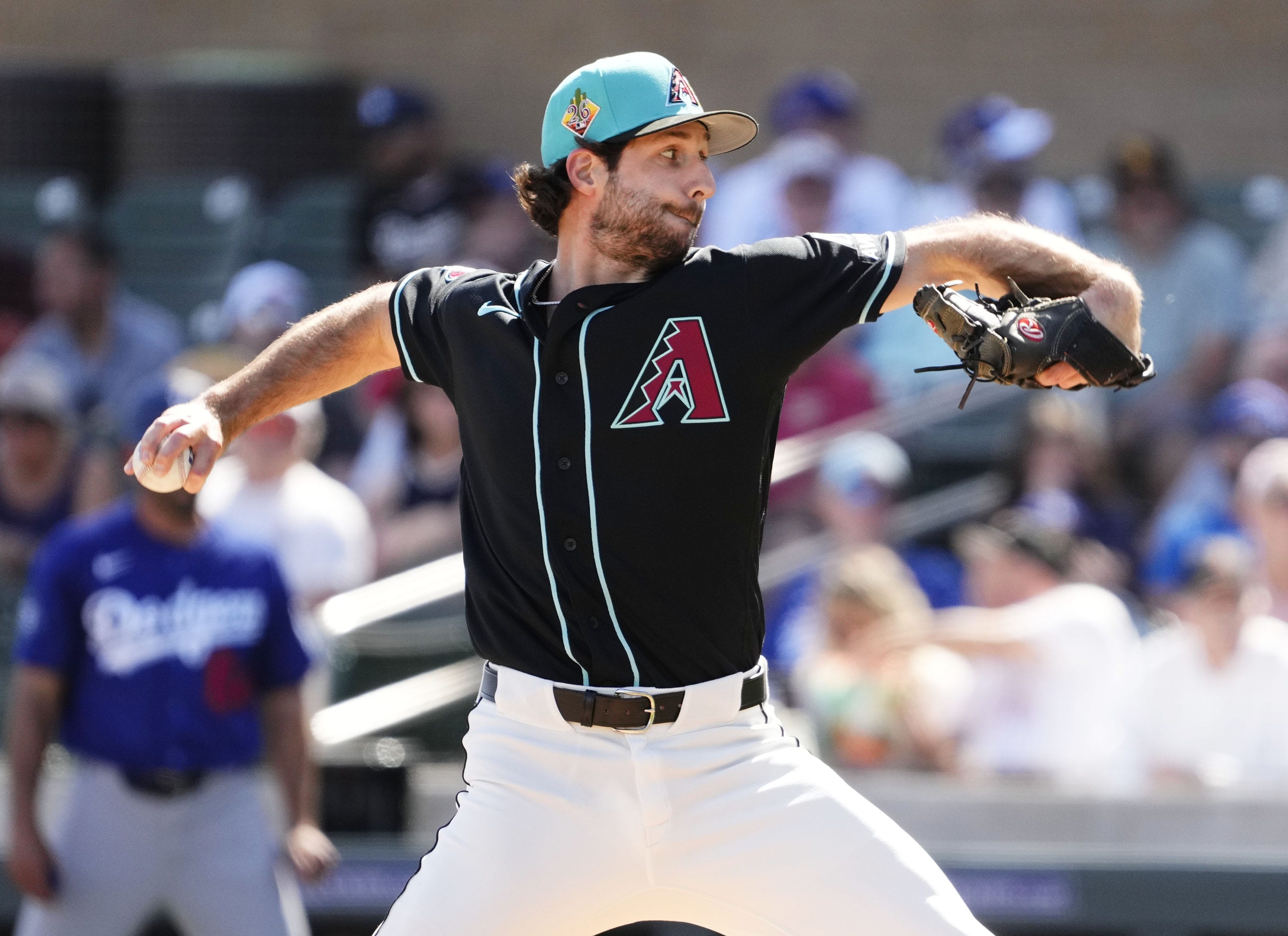 Arizona Diamondbacks pitcher Zac Gallen (23) throws to the Los Angeles Dodgers in the first inning on Feb. 25, 2026, at Salt River Fields in Scottsdale.
