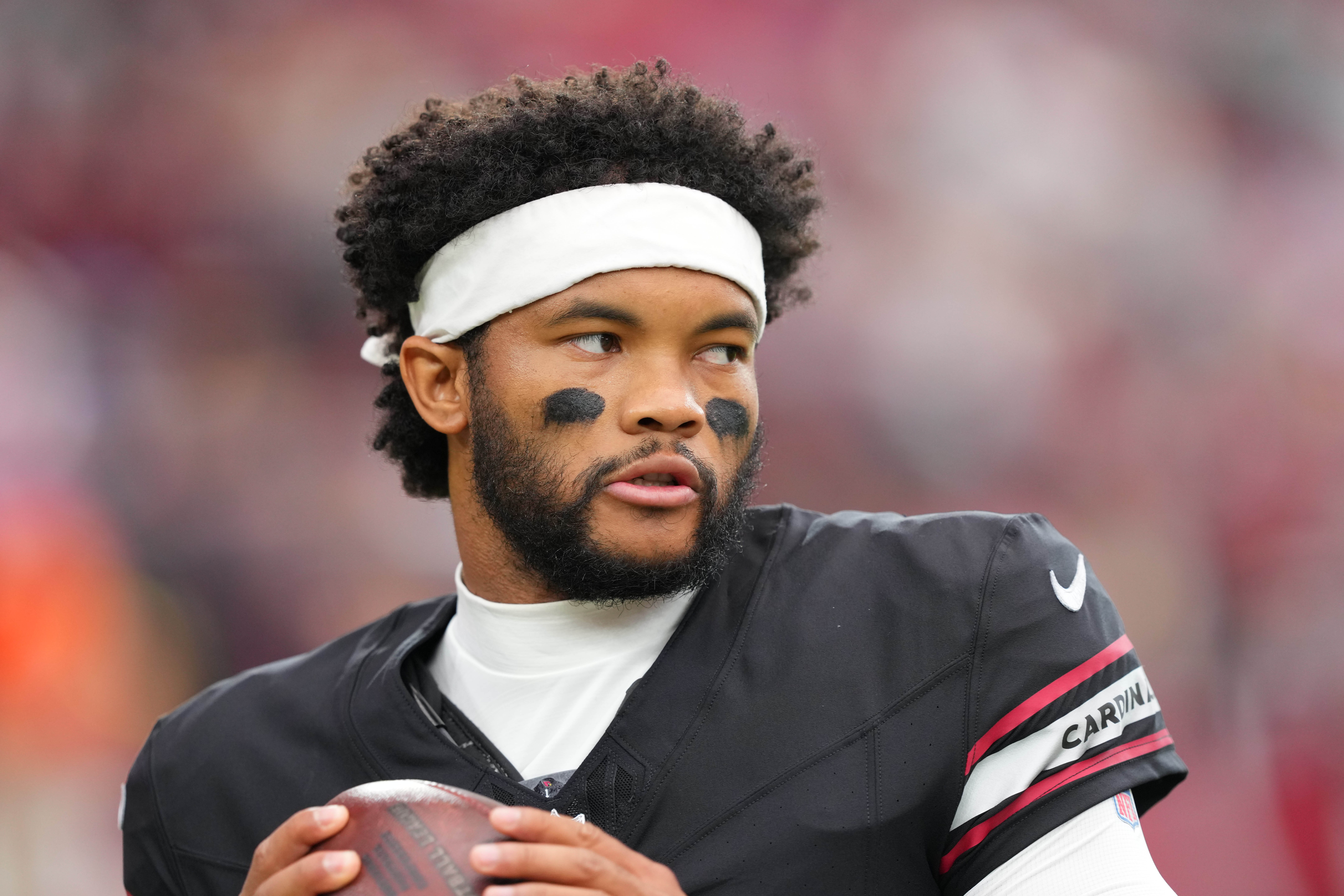 Oct 5, 2025; Glendale, Arizona, USA; Arizona Cardinals quarterback Kyler Murray (1) warms up before their game against the Tennessee Titans at State Farm Stadium.