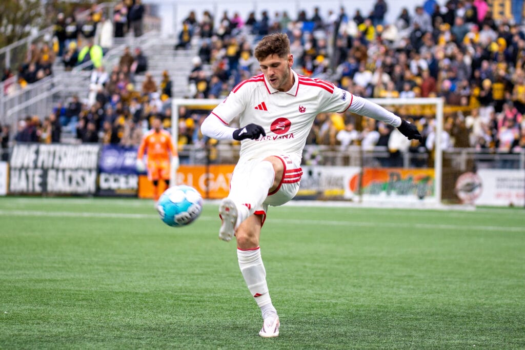 Phoenix Rising defender Luke Biasi plays the ball against Pittsburgh Riverhounds