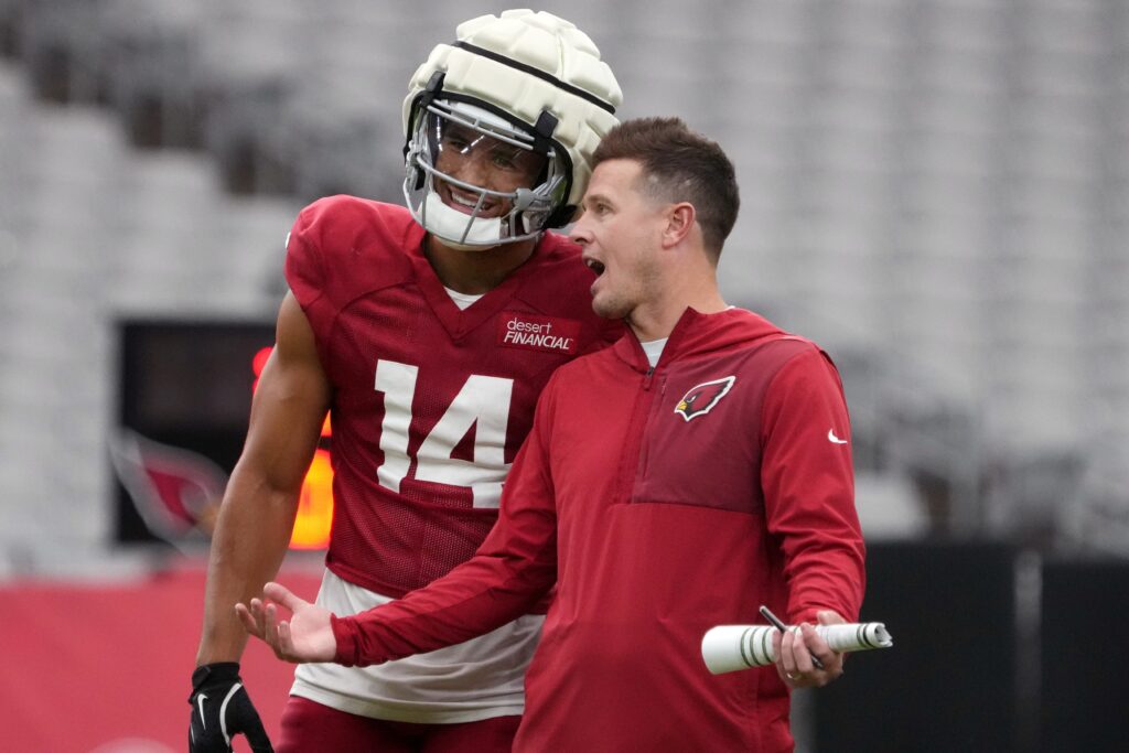 2026 08 10T035047Z 866374070 MT1USATODAY29550681 RTRMADP 3 ARIZONA CARDINALS HEAD COACH MIKE LAFLEUR TALKS TO MICHAEL