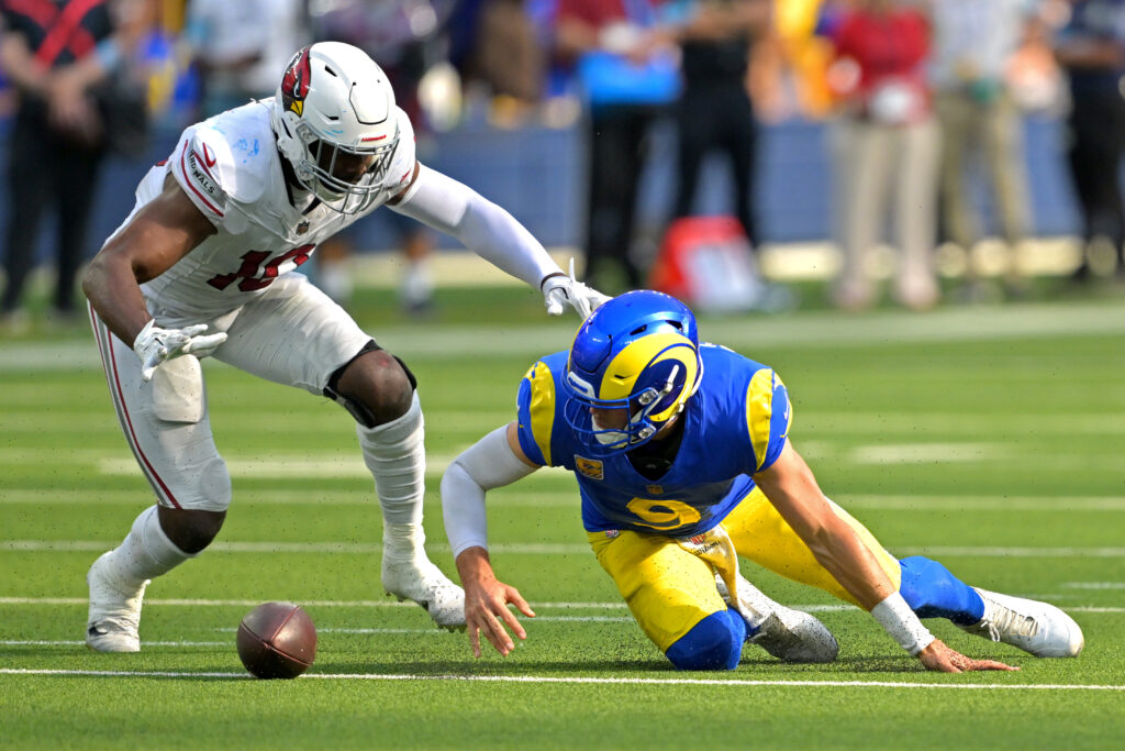 Arizona Cardinals Josh Sweat sacks Rams Matthew Stafford.