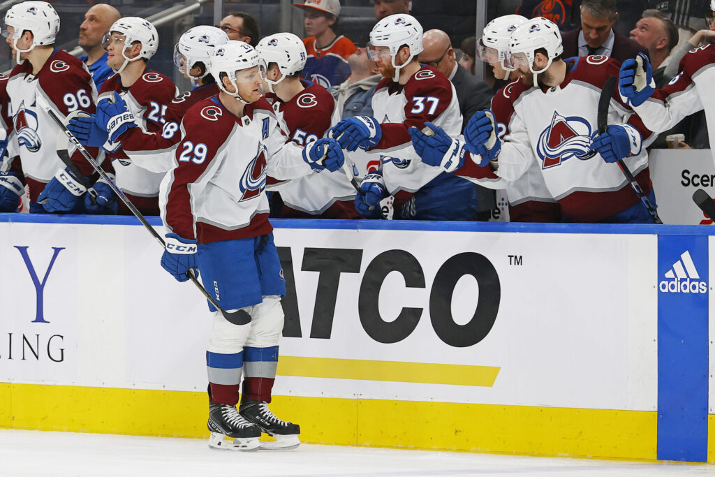 MacKinnon shines as Avs snap skid in comeback win