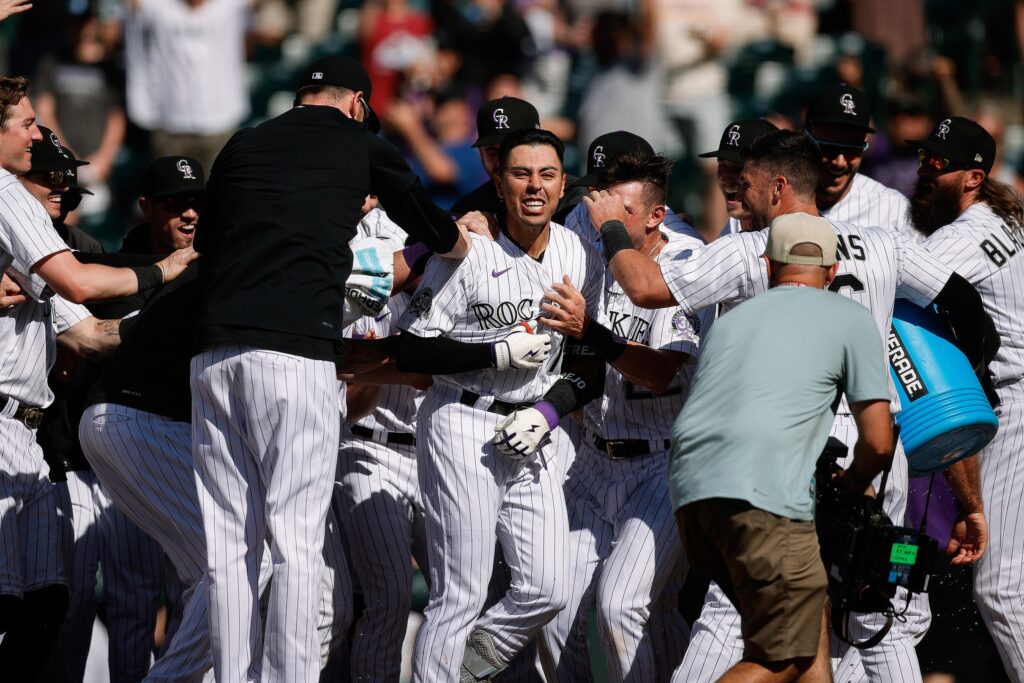 What does the historic win over the New York Yankees mean for the Colorado Rockies second half?