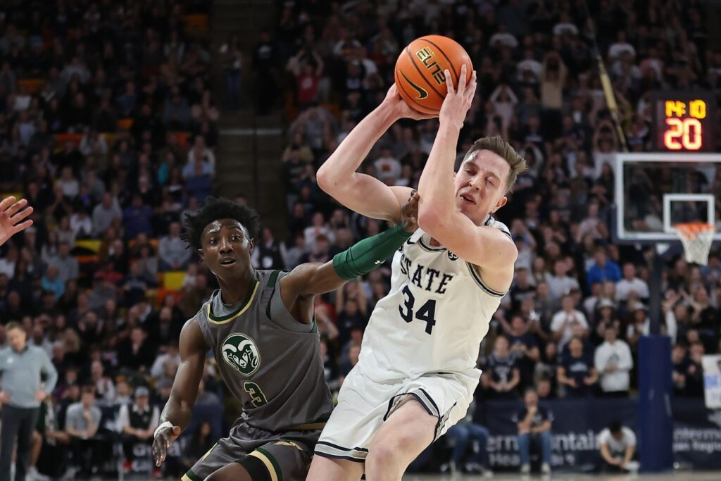 Kendle Moore scores 18 second-half points to lead Colorado State to victory over Utah State on the road
