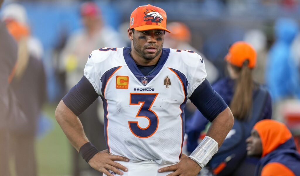 Russell Wilson and Mike Purcell explain what happened during their fiery sideline exchange