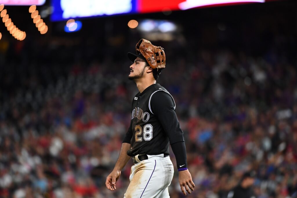 Nolan Arenado traded to the St. Louis Cardinals; Rockies also send sizable sum and receive modest player package