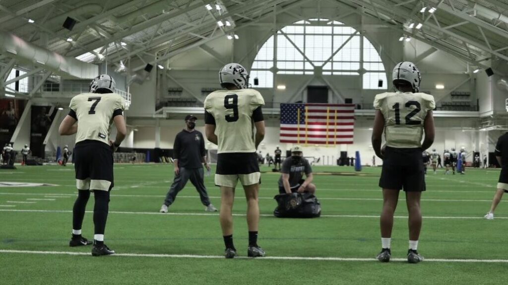 Danny Langsdorf is “pleased” with his quarterbacks halfway through spring camp
