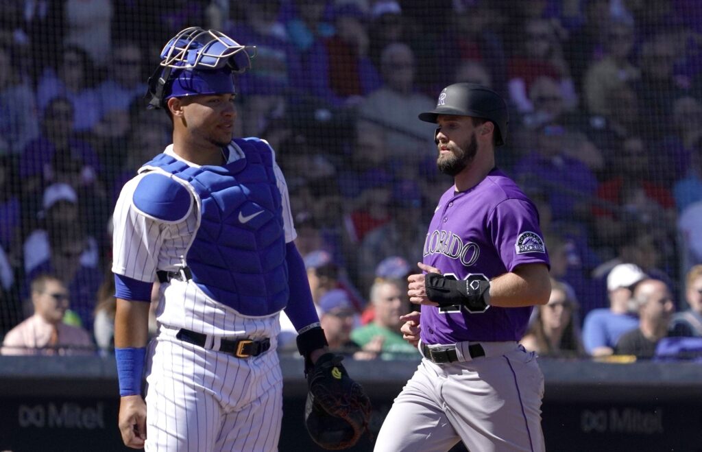 Rockies score early, often for 12 runs to clobber Cubbies