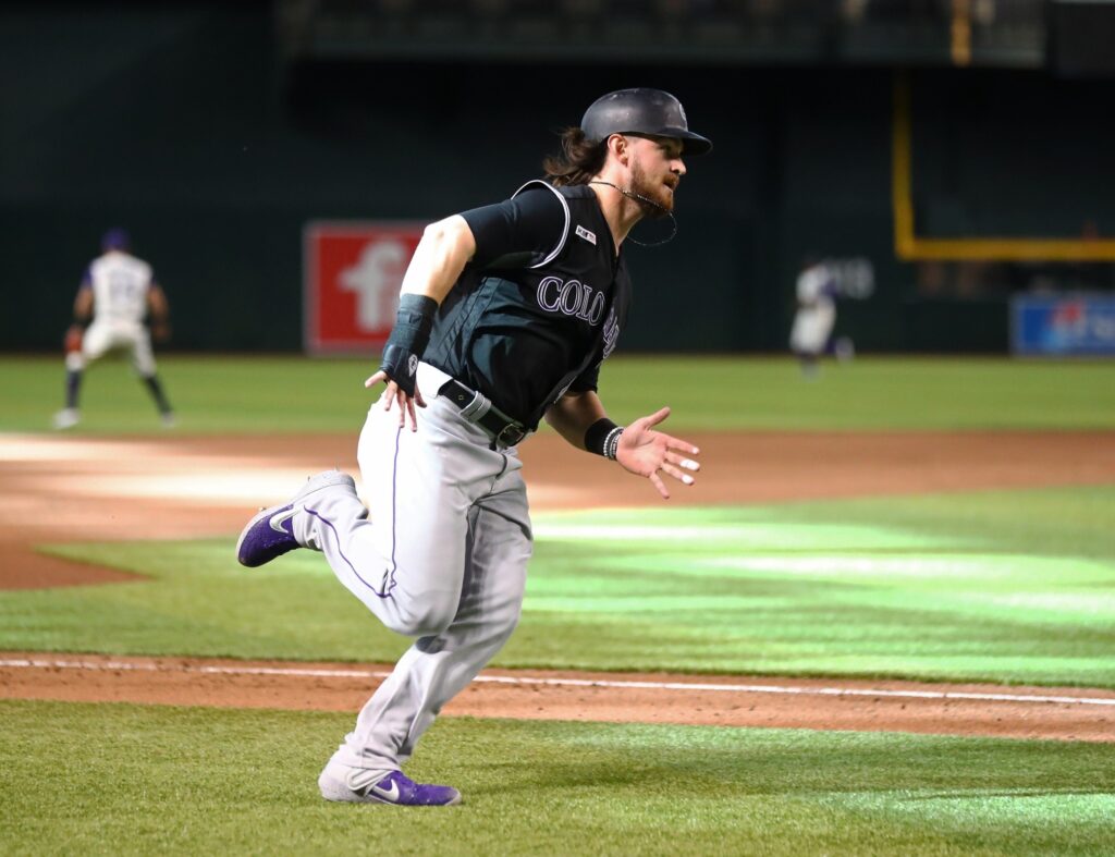 Rodgers gets two hits in spring debut, bullpen implosion wastes four homer day for Rox