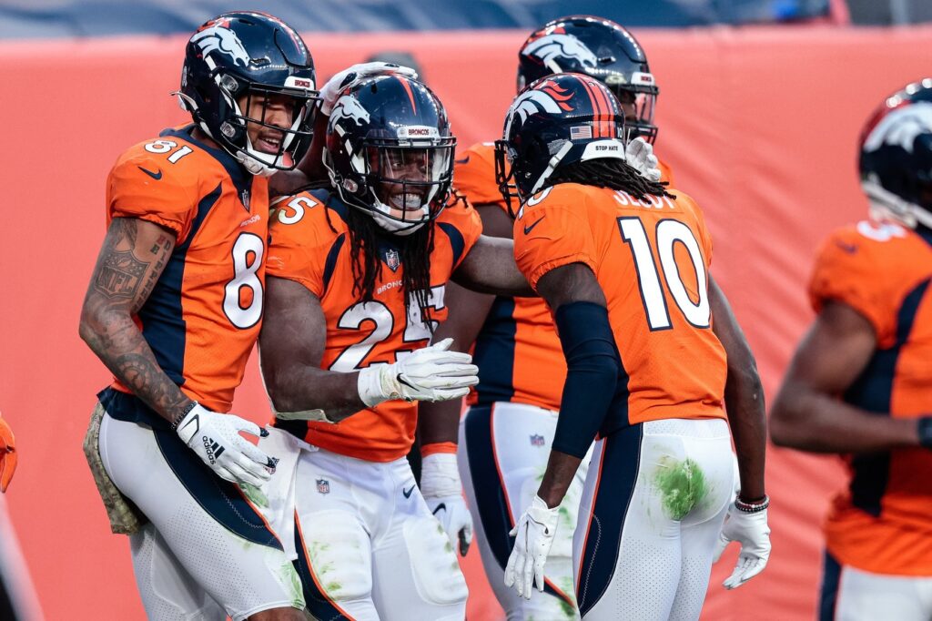 Broncos Roundtable: Is it better for Denver to win or lose on Sunday against Carolina?