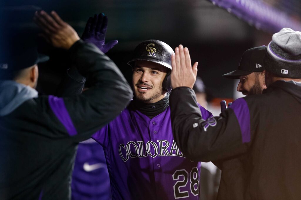 Arenado leads Rockies rally to take series opener from Nats