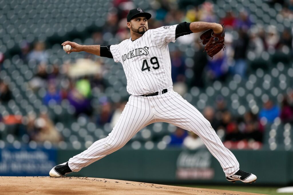 Rockies rally in the rain to run away from the Diamondbacks